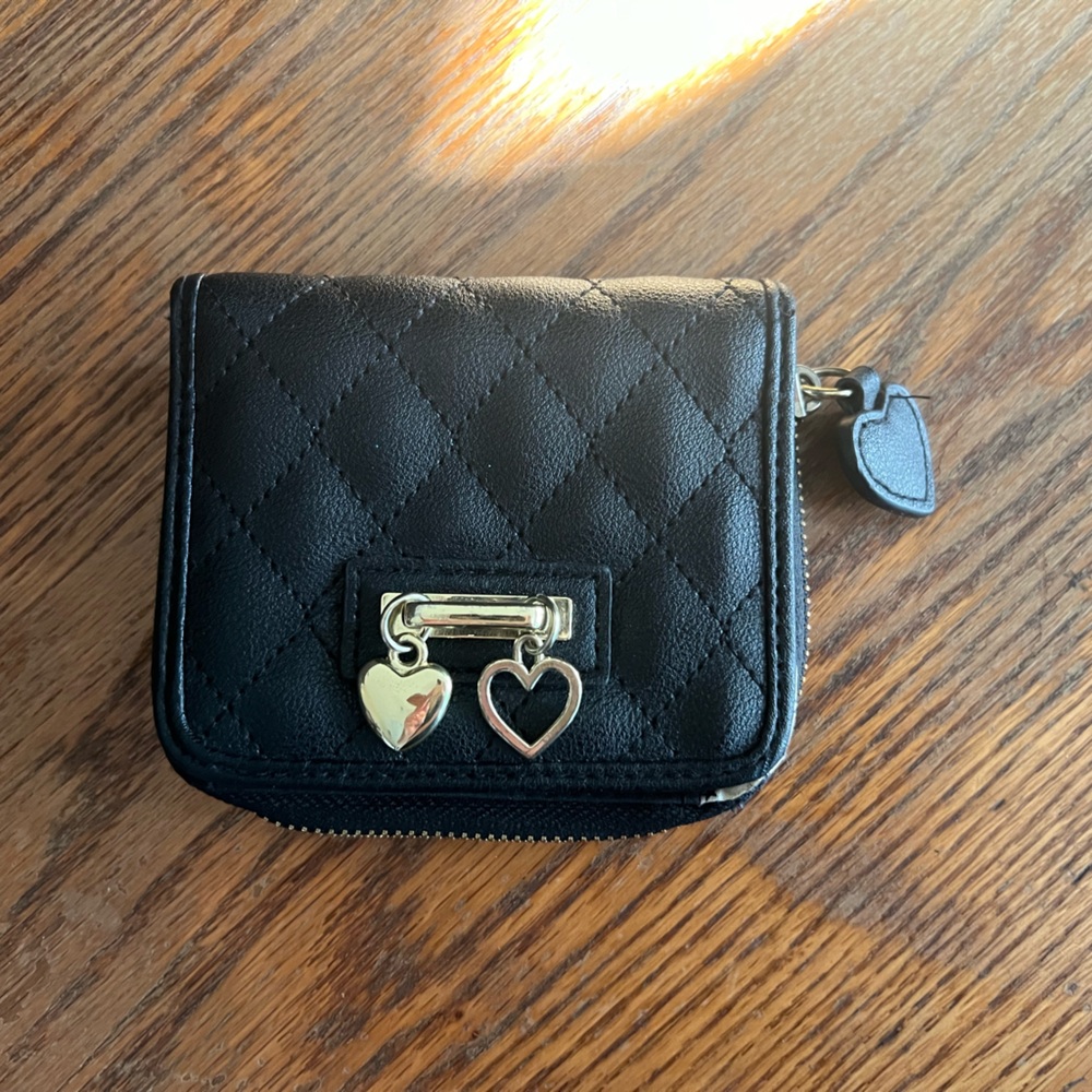 Black Quilted Wallet with Heart Charm and Black and White Stars Design Inside